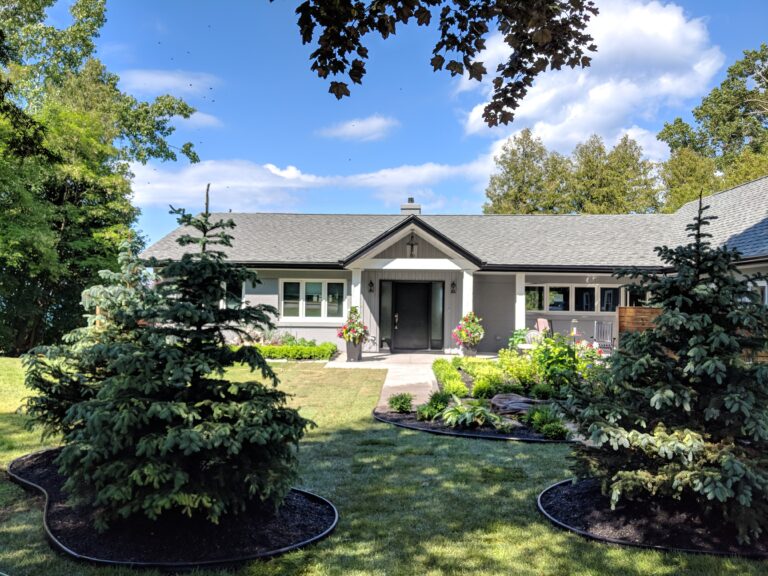 Paving stone front walkway with English garden in Meaford by EcoCultures