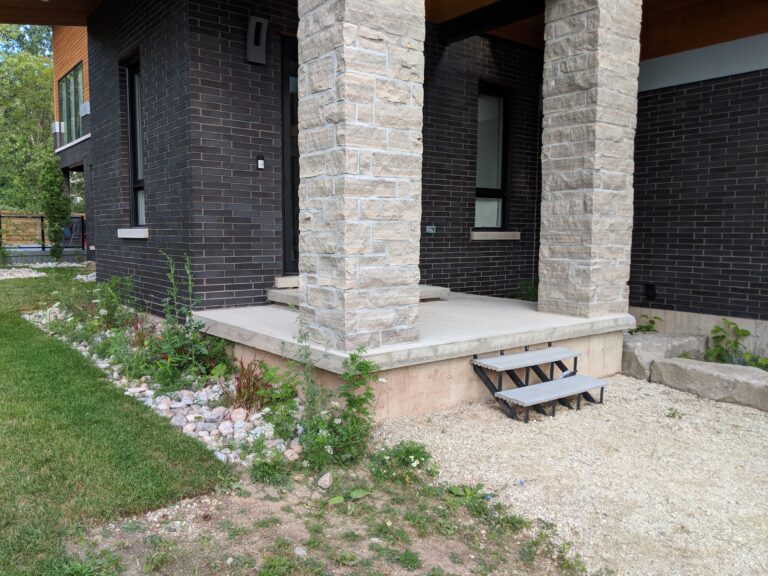 Native pollinator gardens with paver front walkway and stone steps in Blue Mountains by EcoCultures