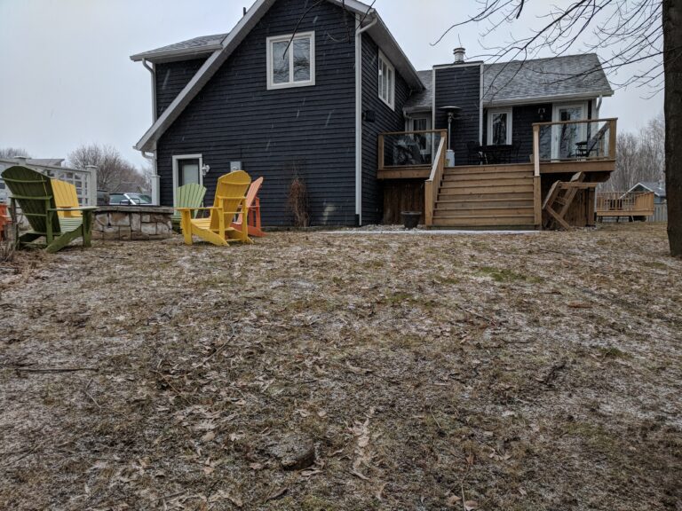 Flagstone patio with fire pit, retaining wall, and native gardens in Blue Mountains by EcoCultures