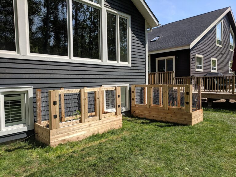 Flagstone patio with fire pit, retaining wall, and native gardens in Blue Mountains by EcoCultures