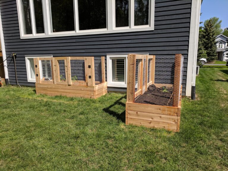Flagstone patio with fire pit, retaining wall, and native gardens in Blue Mountains by EcoCultures